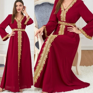 Detailed view of wine red kaftan with gold sequin embroidery and matching belted waist