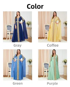 Detail of embroidered Kaftan dresses in navy, yellow, sky blue and mint green with gold motifs