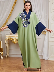Elegant green and blue kaftan with floral sequin embroidery and V-neck loose fit