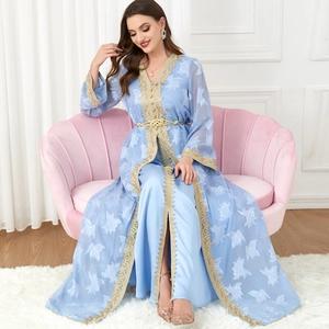 Elegant light blue V-neck kaftan dress with white floral prints and gold embroidery details