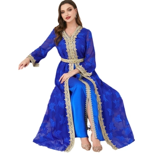Blue Moroccan kaftan two-piece set with heavy gold embroidery and V-neckline