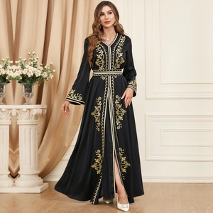 Elegant black long-sleeved dress with gold embroidery and split skirt for autumn