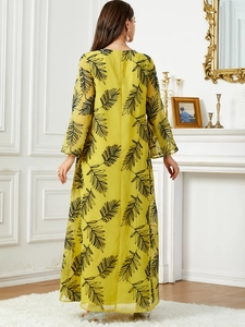 Robe longue élégante en mousseline jaune avec broderie de feuilles noires pour femme