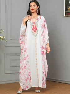 Elegant white Kaftan dress featuring floral digital print and intricate neckline embroidery details