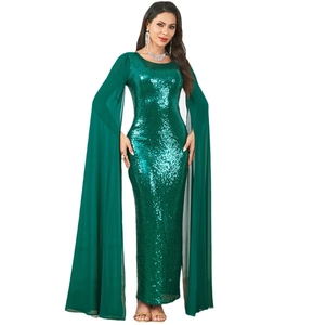 Elegant emerald green sequined evening gown with long chiffon cape sleeves and a slim fit