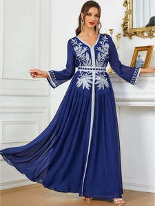 Detailed embroidery on a navy blue chiffon maxi dress with floral silver thread patterns