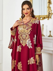 Elegant burgundy kaftan dress with golden lace embroidery and V-neckline detail