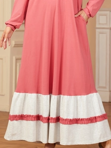 Pink and gray patchwork long sleeve crew neck dress with pleated trim and side pockets