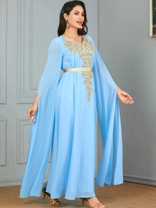 Detail of light blue chiffon kaftan with gold leaf embroidery and long split sleeves
