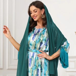 Elegant floral print dress with a solid dark green tasseled hijab for Muslim women