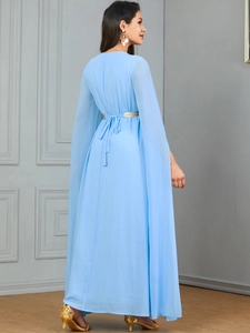 Detail of light blue chiffon robe dress featuring elegant cape sleeves and gold belt accent