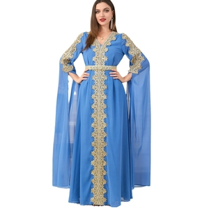 Elegant blue kaftan dress with long split sleeves and ornate golden floral embroidery