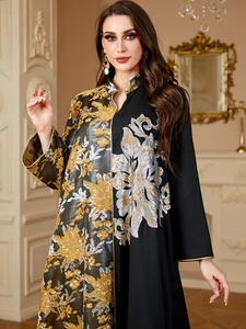 Detailed embroidery and gold jacquard panel on this V-neck long-sleeved kaftan dress