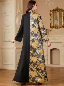 Rear view of long abaya with black and gold jacquard patchwork and gold piping