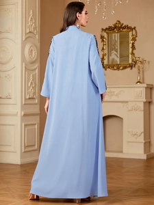 Light blue V-neck modest long dress with sequined sleeve embroidery and A-line silhouette