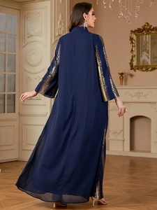 Detail view of navy chiffon abaya with gold and silver sequin embroidery on sleeves