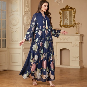 Elegant navy blue abaya with gold floral embroidery and decorative tassels