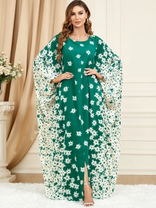 Green loose floral kaftan dress with batwing sleeves and white daisy print detail