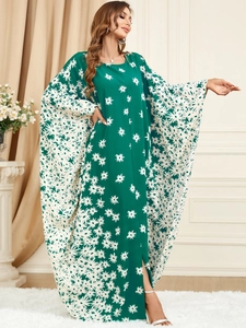 Elegant dark green kaftan dress with white floral daisy pattern and wide batwing sleeves