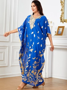 Blue kaftan dress with gold floral print, sequin embroidery and batwing sleeves