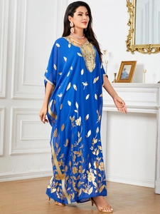 Elegant royal blue kaftan dress with golden leaf patterns and batwing sleeves