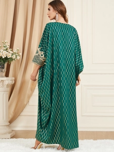 Elegant deep green kaftan dress with gold vertical prints and embroidered sleeves