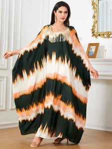 Elegant batwing sleeve kaftan dress with colorful zigzag print and golden metallic tassels