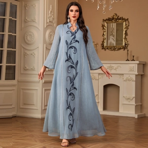 Elegant light blue long sleeve maxi dress with navy blue floral embroidery and v-neckline