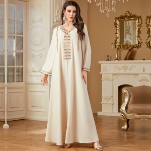 Elegant ivory Abaya with intricate red and gold bead embroidery and V-neckline detail