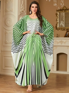 Elegant long kaftan dress with green and white stripes and batwing sleeves detail