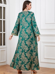 Detailed back view of dark green Kaftan dress with golden floral jacquard and embroidery