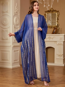 Elegant royal blue two-piece abaya set with intricate gold sequins and white inner dress