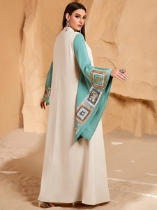 Elegant beige and mint green kaftan dress with sequined wide sleeves for luxury fashion