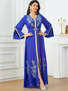 Elegant royal blue kaftan dress with gold embroidery, sequins and fringe hem details