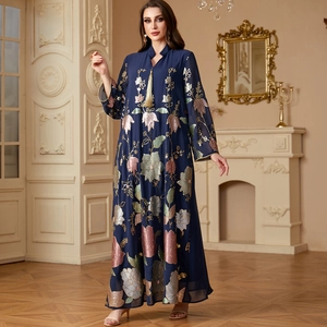 Elegant navy blue kaftan dress with gold tassel V-neck and floral embroidery detailing