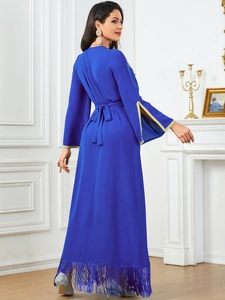 Elegant navy blue long sleeve maxi dress with flared sleeves and tassel hem decoration