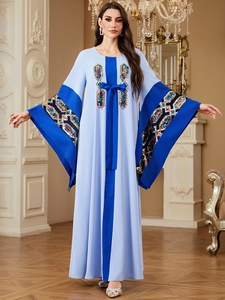 Light blue Kaftan dress with sequin embroidered sleeves and a bow belt detail