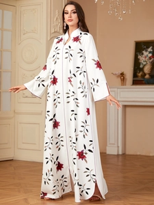 Elegant white long-sleeve maxi dress featuring red floral print and stand collar