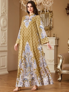 Elegant mustard yellow maxi dress with vintage floral prints and geometric patterns