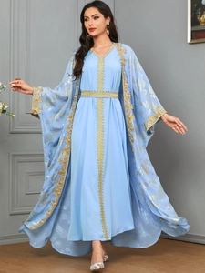 Detail of light blue Abaya set with intricate gold floral embroidery and sequin lace trim
