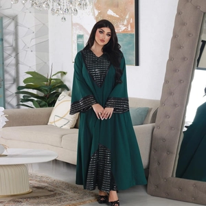 Elegant dark green Abaya maxi dress with silver sequin stripes and long sleeves