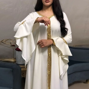 Elegant white kaftan dress with golden sequin embroidery and ruffled bell sleeves