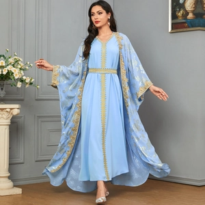 Light blue Middle Eastern two-piece dress set with intricate gold lace embroidery