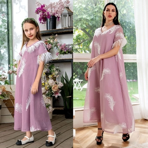 Detail of purple V-neck mesh dress with white feather embroidery for mother and daughter