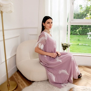 Detailed embroidery of white feathers on a lavender long chiffon kaftan dress for women
