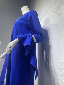 Close-up of royal blue Abaya dress featuring elegant lotus sleeves and silver lace trim