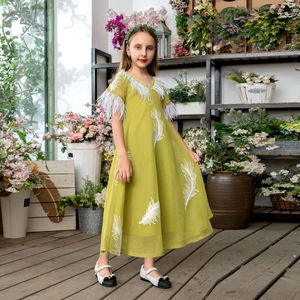 Light green princess dress for girls with white feather prints and fringe trimming