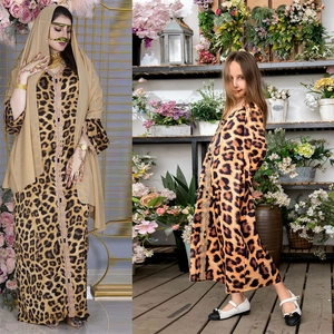Detailed leopard print kaftan with elegant gold lace trim for mother and daughter outfits