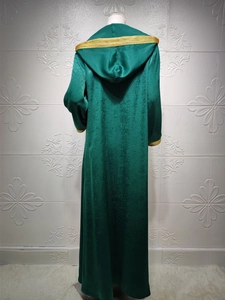 Rear view of dark green velvet hooded robe with ornate gold woven trim on edges