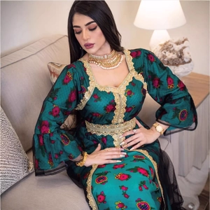 Ethnic dark green embroidered mesh maxi dress with golden lace and floral patterns